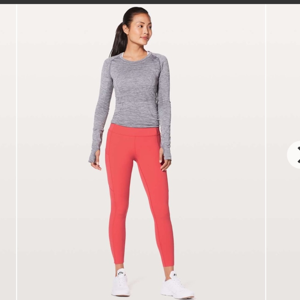 • Lululemon • Women’s Fast & Free 7/8 Tight II Nulux 25"
Red Orange / Coral 4